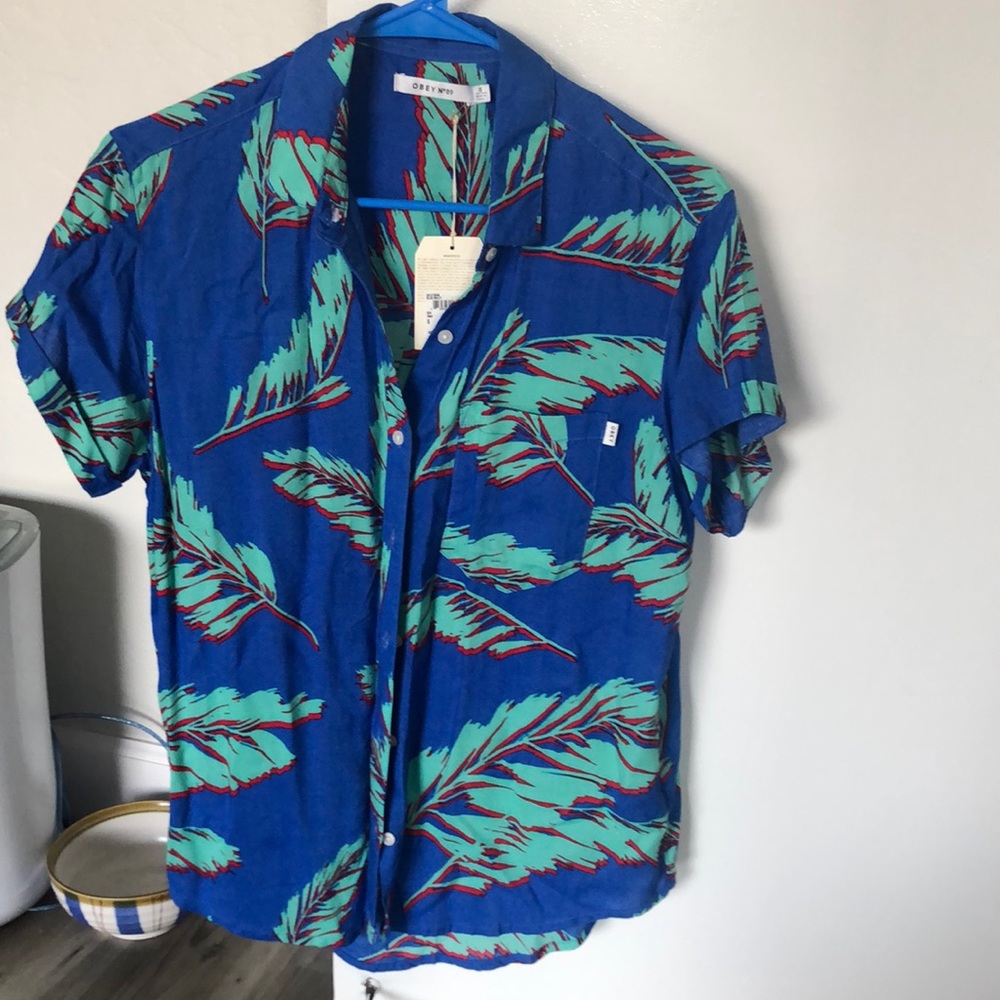 Blue fenix shirt, brand new, size small.
